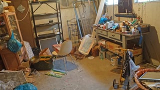 Before: Cluttered basement
