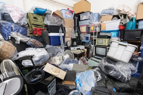 Cluttered living room before